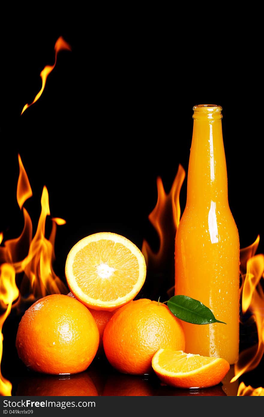 Hot orange drink with fire flames