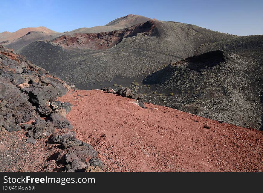 Old craters and multicolor ground after volcanic eruption. Old craters and multicolor ground after volcanic eruption