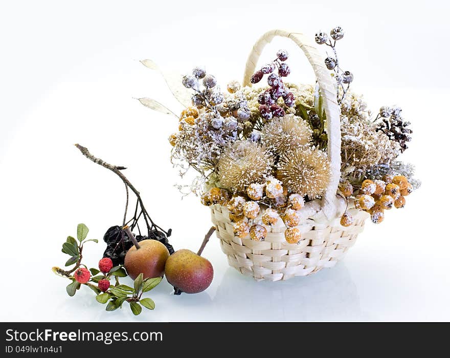 Winter decorations with fruit in the basket