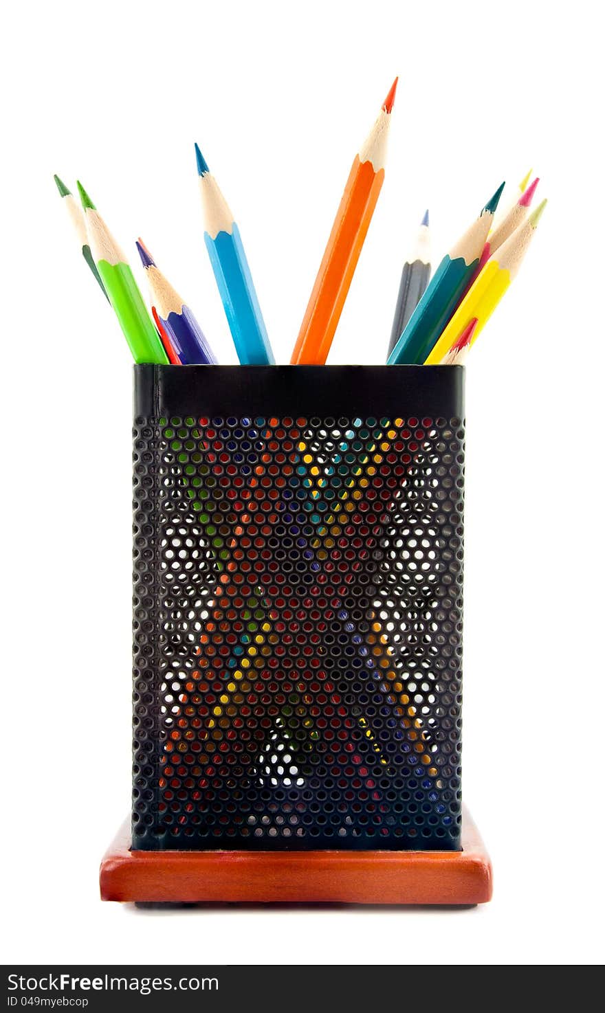 Color pencils in the glass on a white background. Color pencils in the glass on a white background