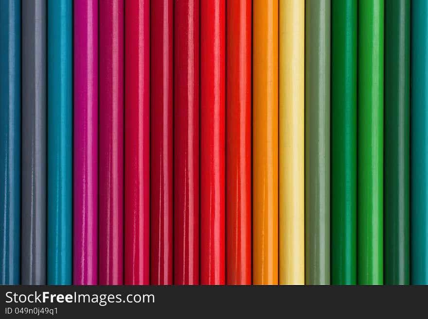 Colored pencils in green, red and blue color shades in a row. Colored pencils in green, red and blue color shades in a row