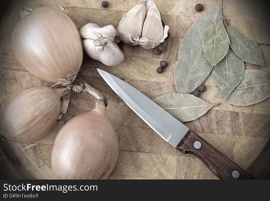 Still life with onions, garlic and black pepper. Still life with onions, garlic and black pepper