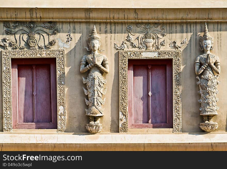 Tample Window With Two Angels In Thai Temple