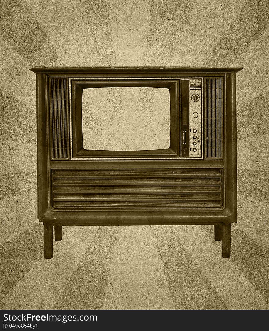 Vintage television on grunge paper with abstract sun rays