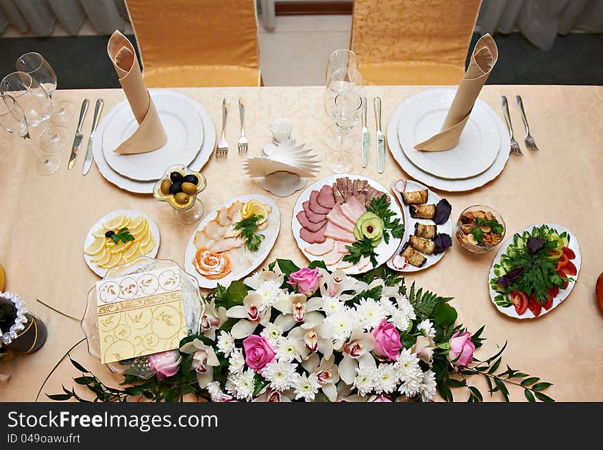 Wedding table for the bride and groom in restaurant. Wedding table for the bride and groom in restaurant