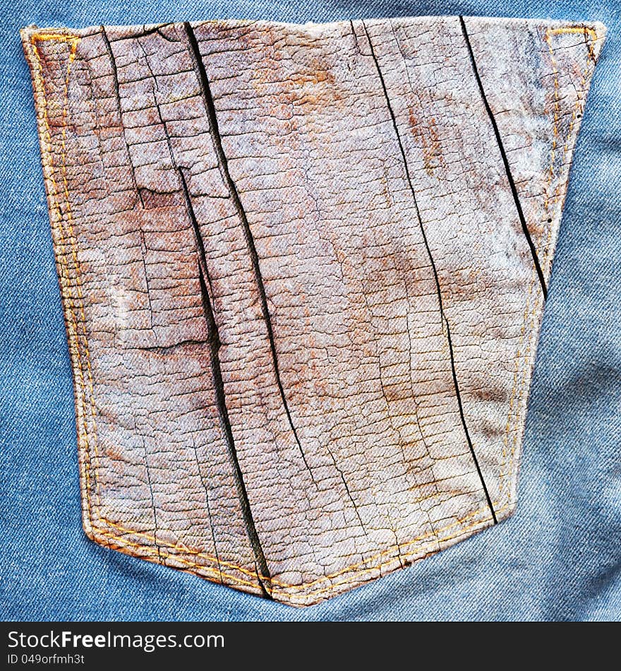 Jeans with a wooden texture on the back pocket. Jeans with a wooden texture on the back pocket