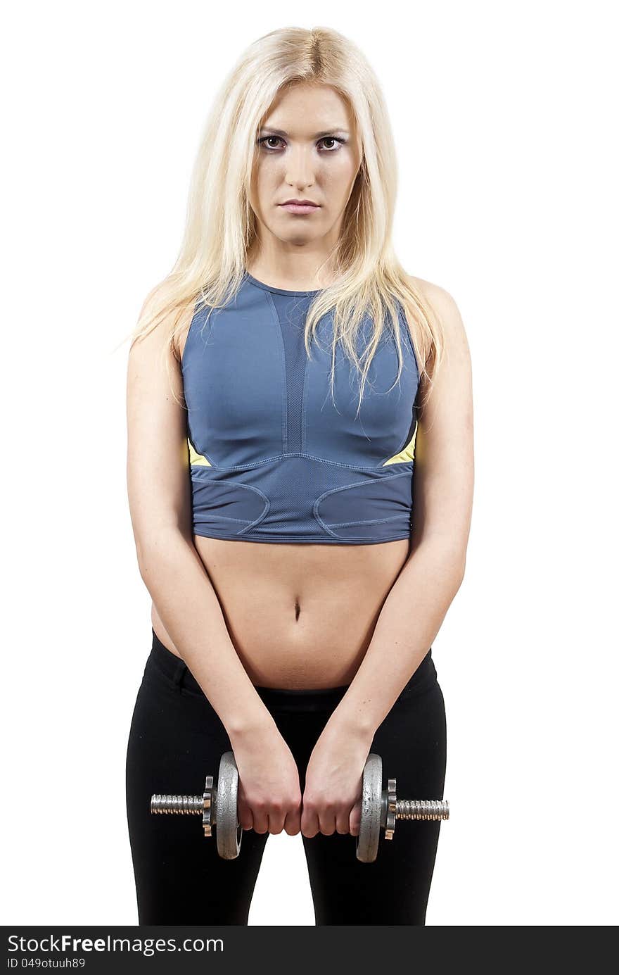 Beautiful athlete holding dumbbell isolated