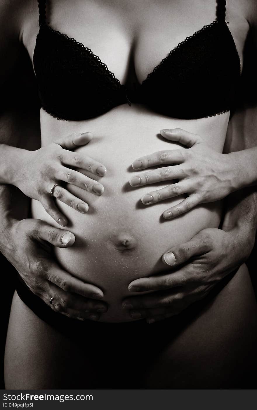 Hands On Pregnant Woman S