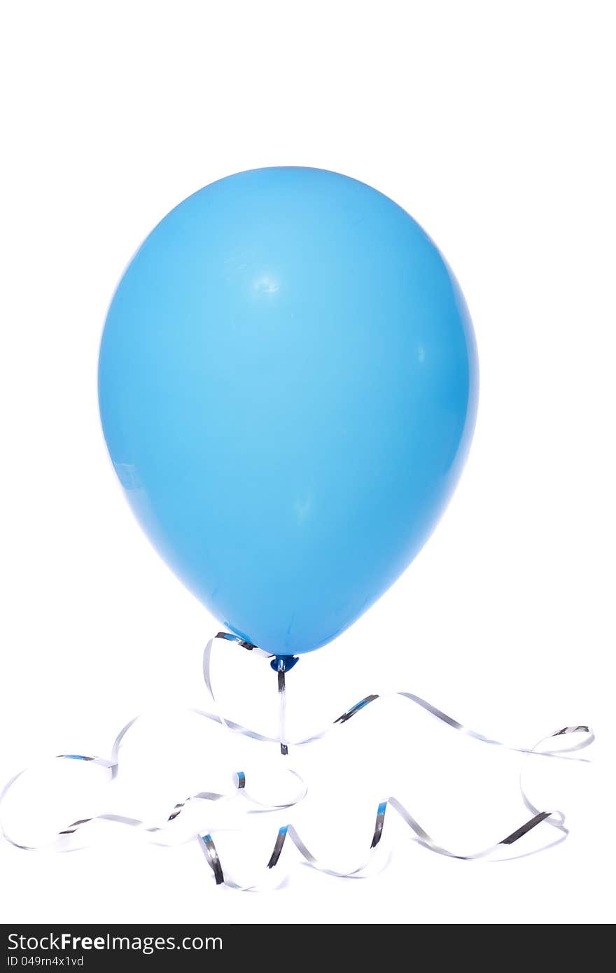 Close view of a blue inflated balloon isolated on a white background. Close view of a blue inflated balloon isolated on a white background.