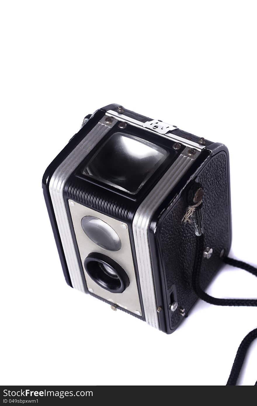 Close view of a vintage dual lenses reflex camera isolated on a white background. Close view of a vintage dual lenses reflex camera isolated on a white background.