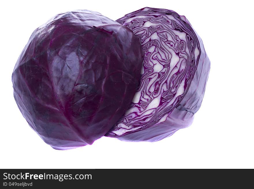 Close view of a sliced red cabbage isolated on a white background.