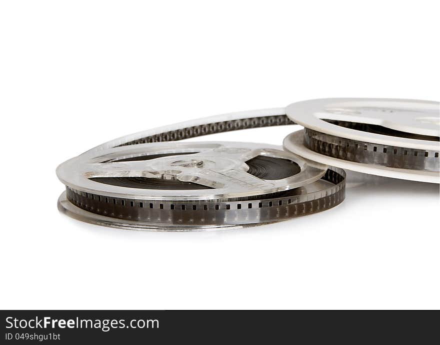 Old film reel on a white background. Old film reel on a white background