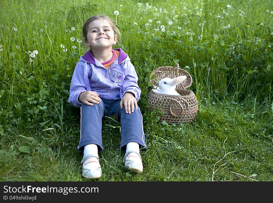 Adorable Little girl smiling with  white rabbit. Adorable Little girl smiling with  white rabbit