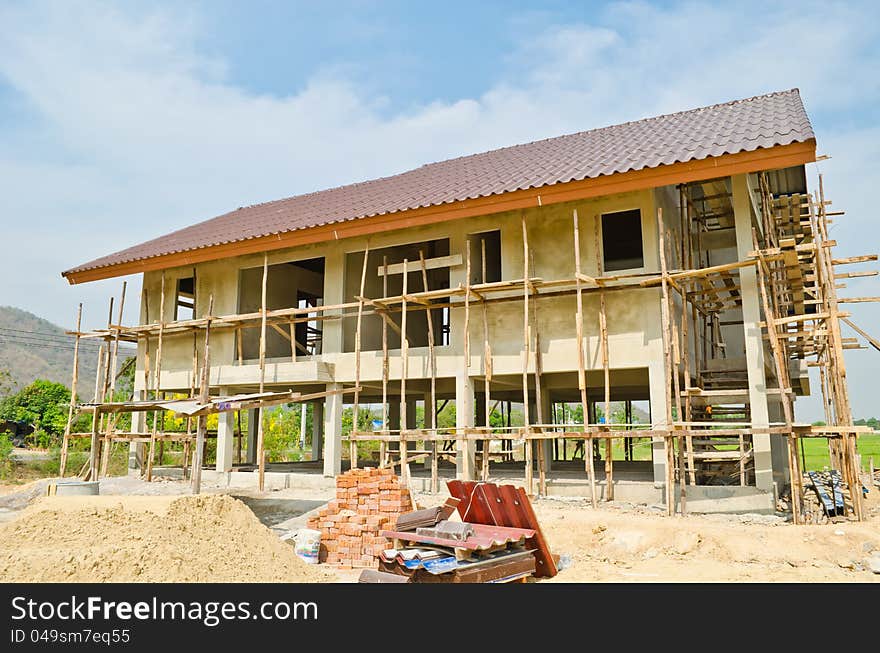 A new home under construction with sky background