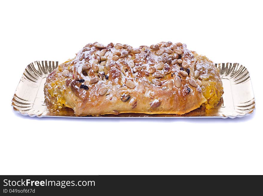 Close view of a traditional Portuguese Easter cake isolated on a white background.