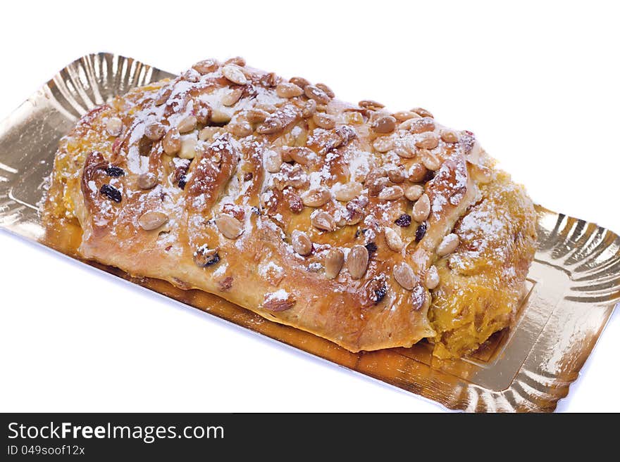 Close view of a traditional Portuguese Easter cake isolated on a white background.