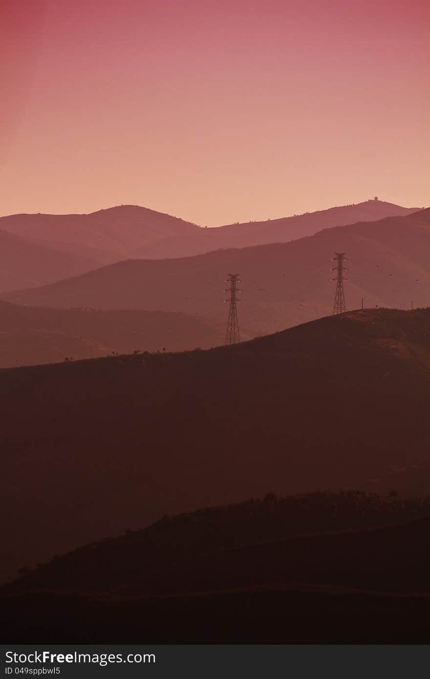 View of a eerie landscape with mountains at dawn.