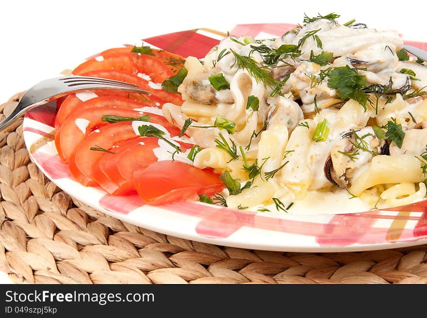 Pasta with seafood on white background