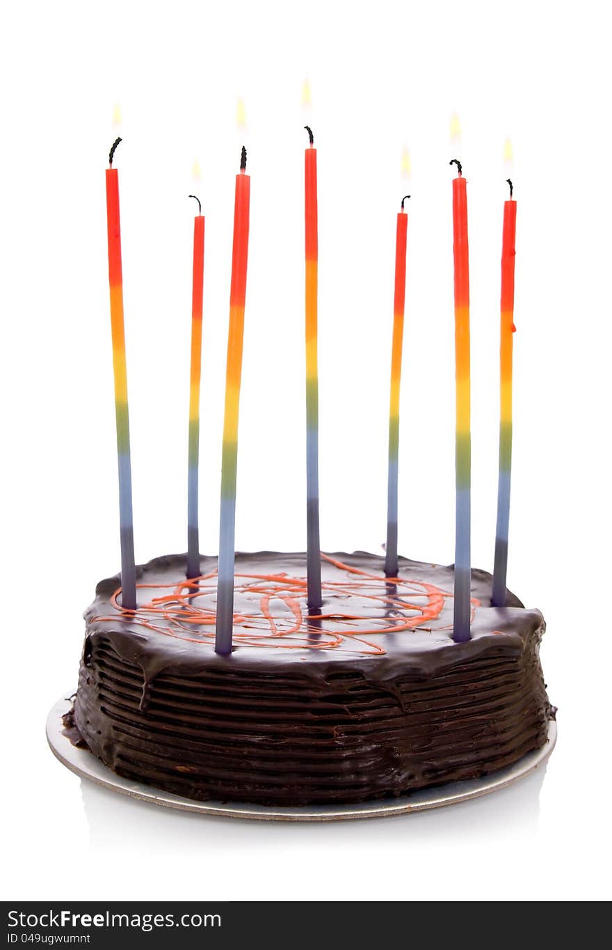 Isolated objects: cake with rainbow candles