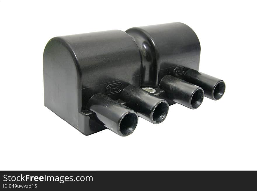 Ignition coil for the four-cylinder engine on a white background