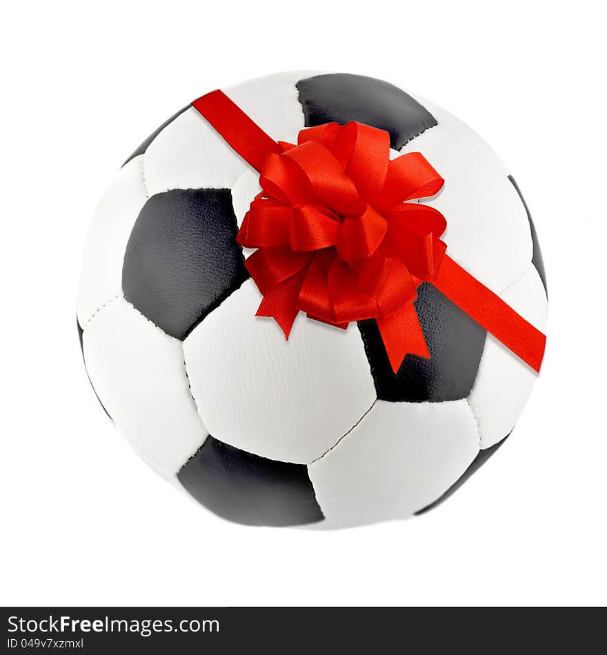 Red Gift Ribbon Bow in Soccer ball isolated on white background