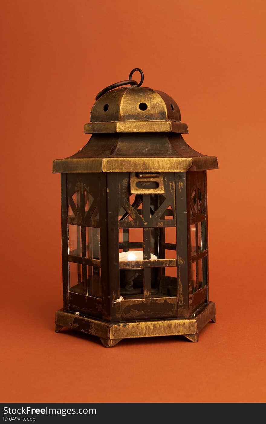 Burning lantern in the dark