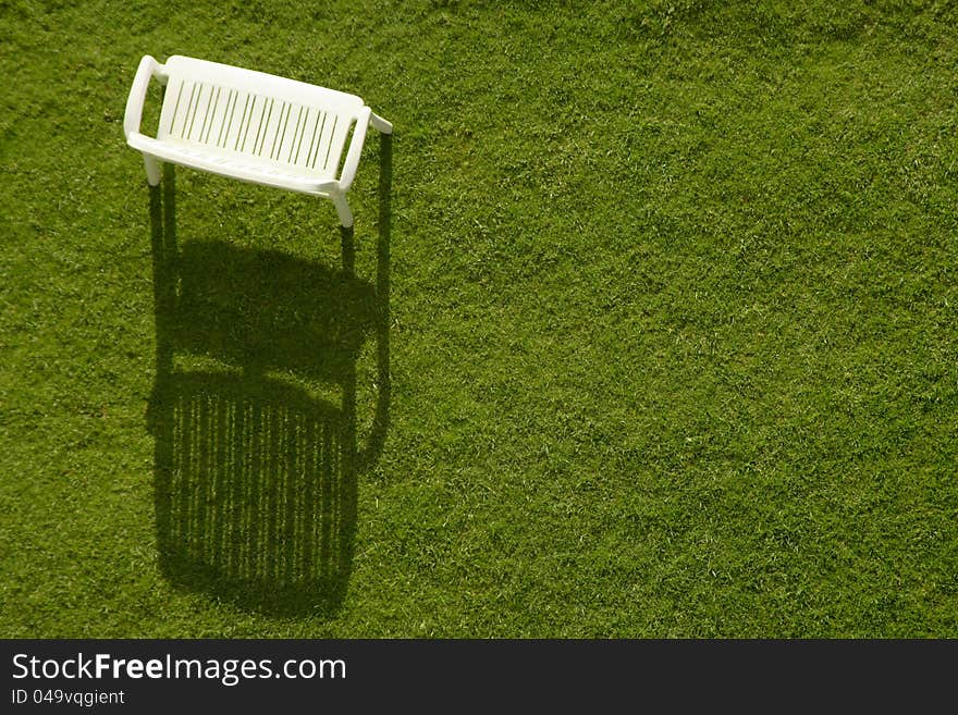 Chairs set out in the lawn at evening