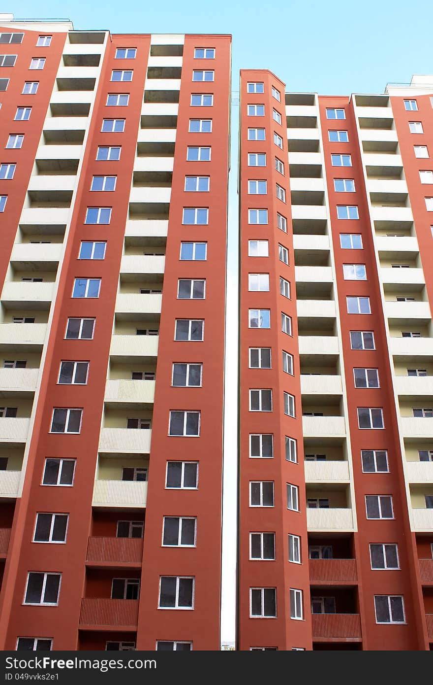 Rows of Apartment with Blue Sky in Background. Rows of Apartment with Blue Sky in Background