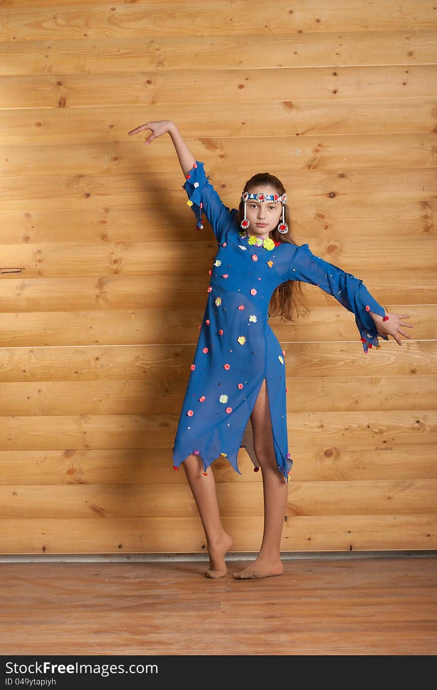 Girl Dancing In Blue Dress