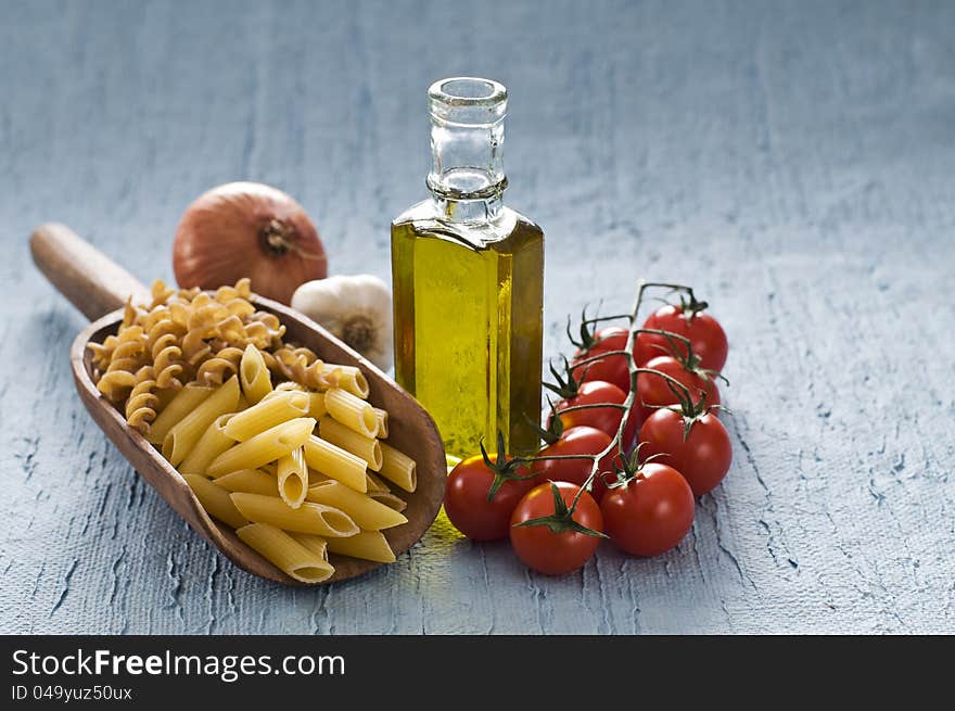 Cooking ingredients on blue background close up