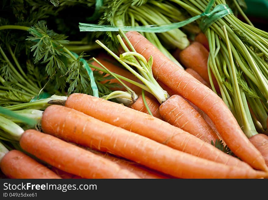 Fresh vegetables, carrots on a market