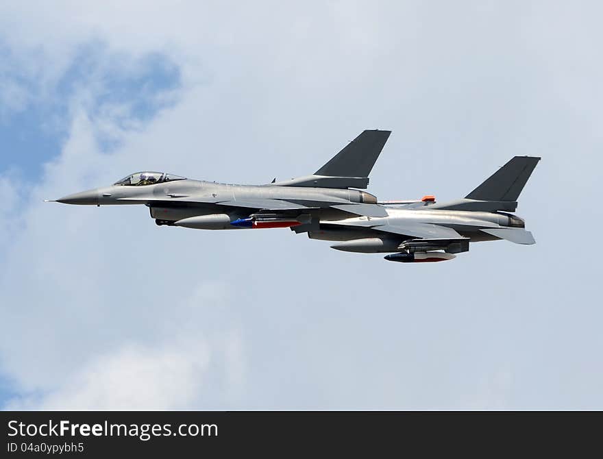 Two modern fighter jets at high altitude. Two modern fighter jets at high altitude