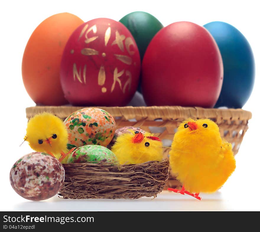 Easter eggs and decorations in a basket. selective focus on chicks. Easter eggs and decorations in a basket. selective focus on chicks