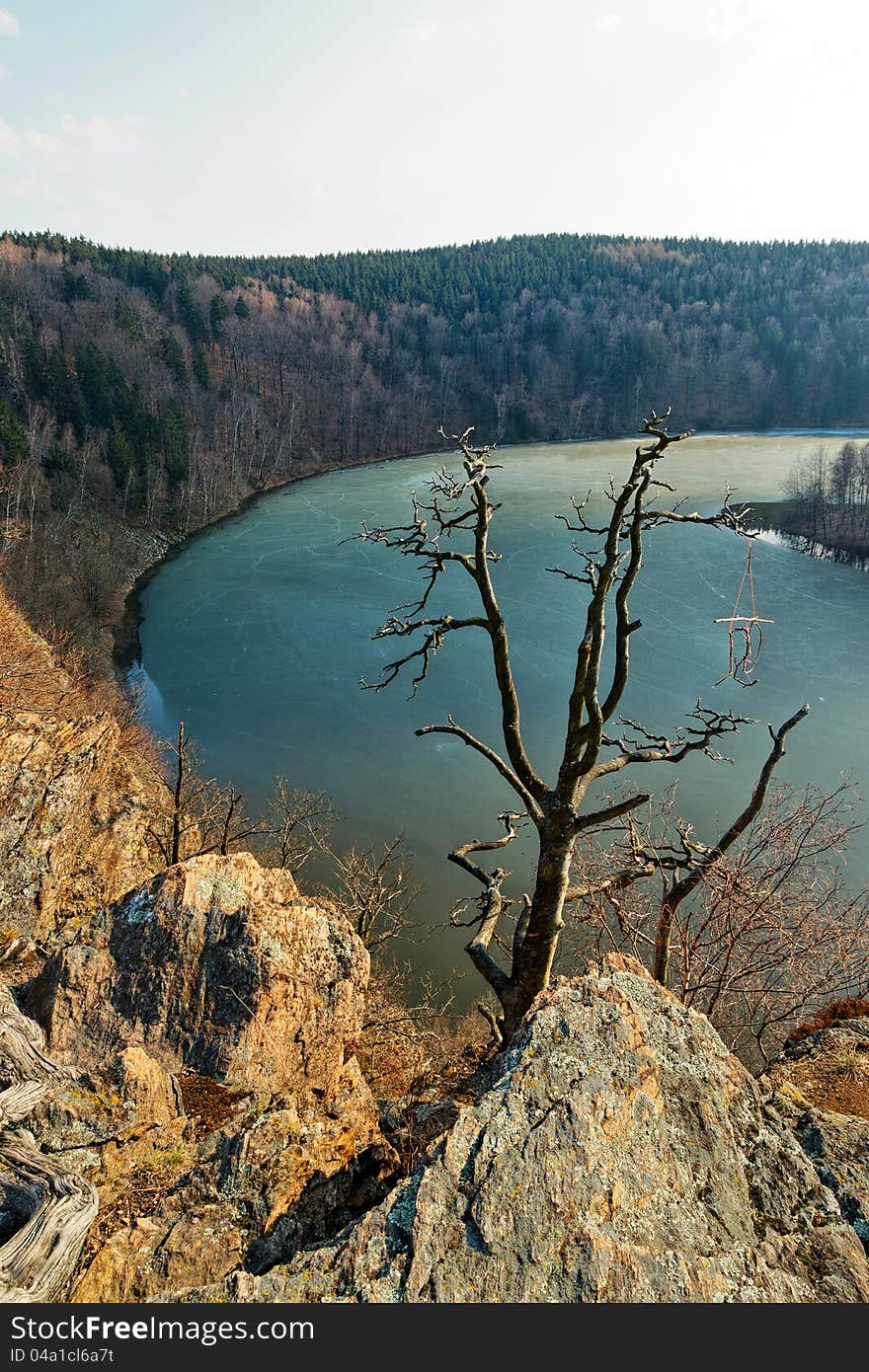 Sec dam with melting ice on surface, image taken from Oheb castle.