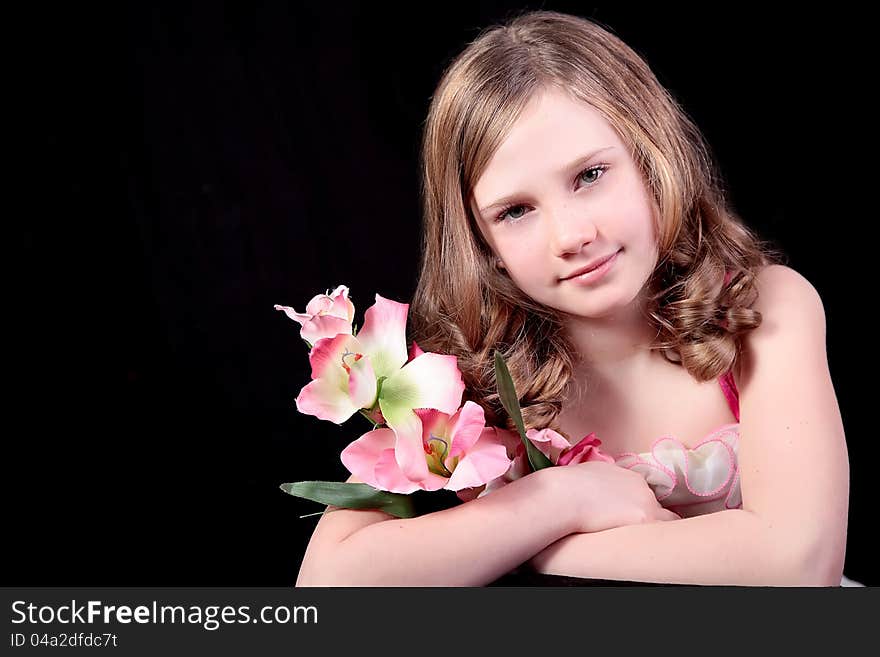 A pretty girl holding flowers