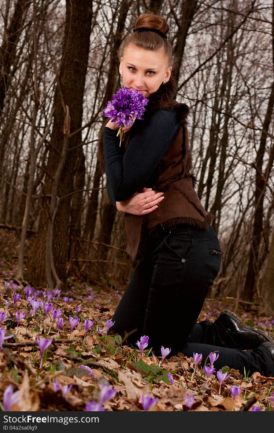 Girl with snowdrops