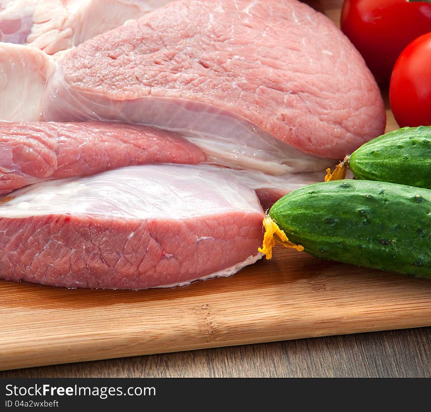 Meat with vegetables on a table