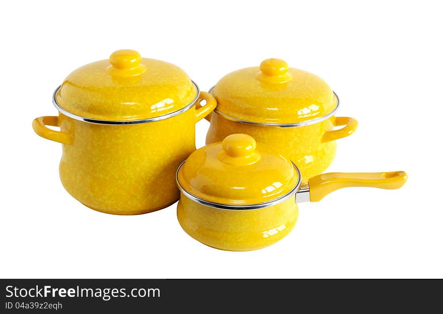 Three new yellow saucepans on white background. Clipping path is included. Three new yellow saucepans on white background. Clipping path is included