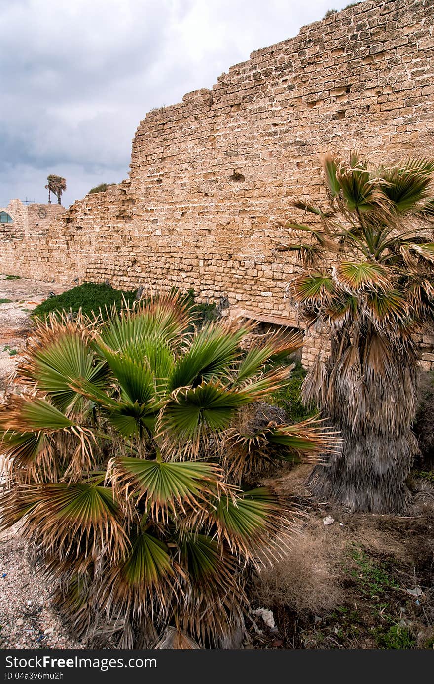 Ruins of the ancient Romanian harbor, Caesarea, Israel .