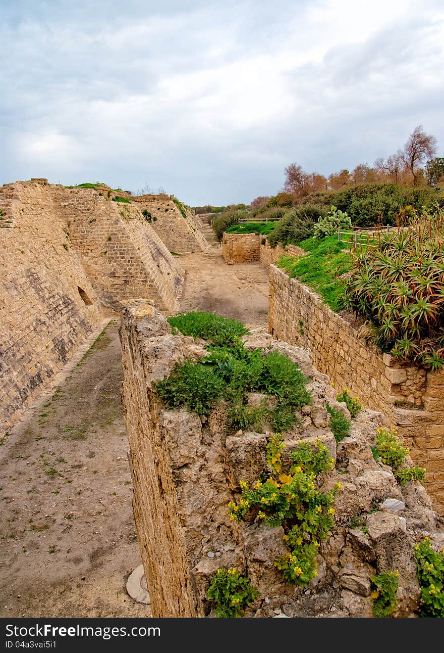 Ruins of the ancient Romanian harbor, Caesarea, Israel .