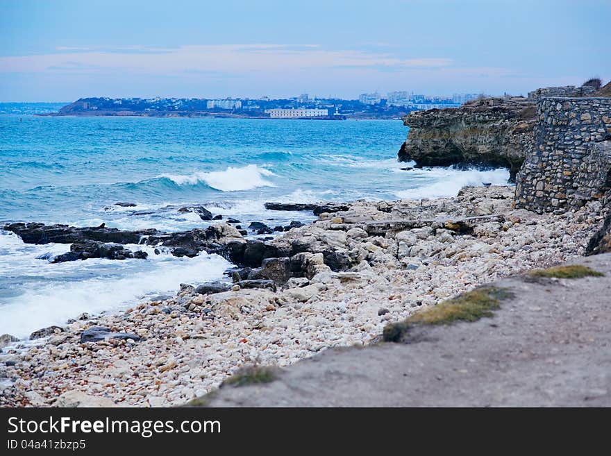 Landscape with the sea, waves and ruins of the ancient Khersones city in Crimea. Ukraine. Landscape with the sea, waves and ruins of the ancient Khersones city in Crimea. Ukraine