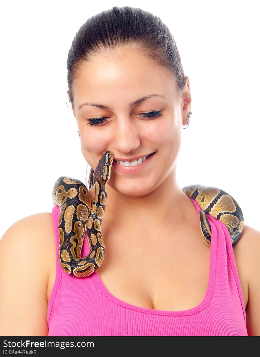 Cute smiling teenage girl playing with small pet python isolated on white. Cute smiling teenage girl playing with small pet python isolated on white.