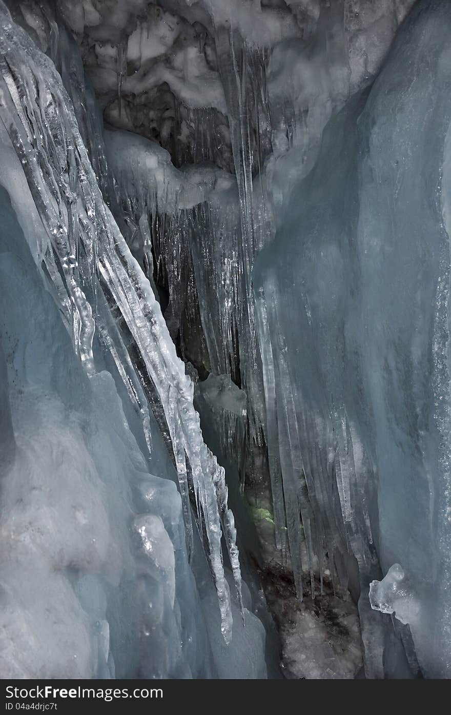 Stalactites in a crevasse inside the Hintertux glacier in Zillertal Alps in Austria. Stalactites in a crevasse inside the Hintertux glacier in Zillertal Alps in Austria.