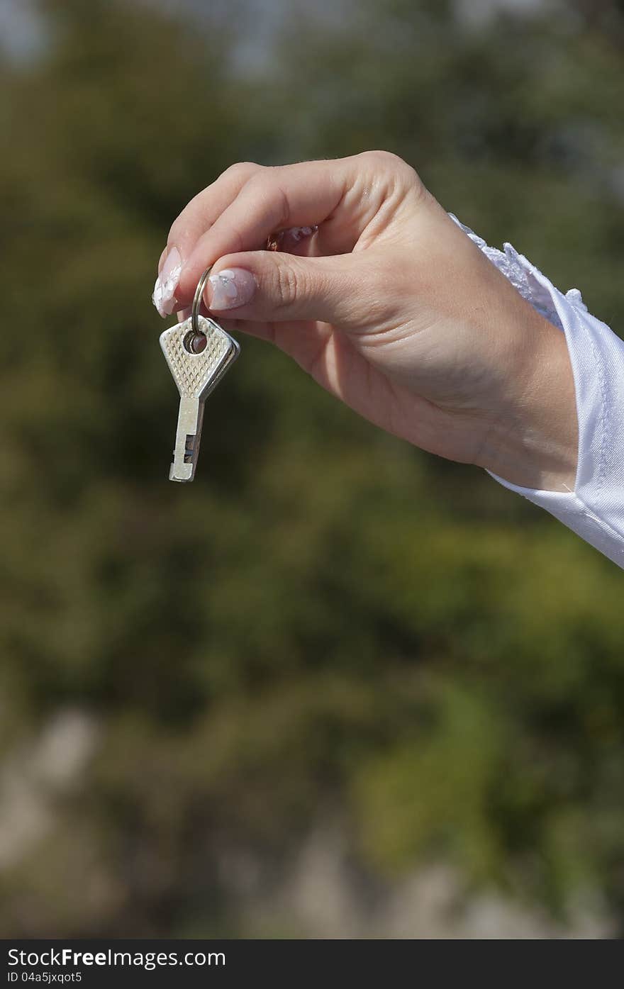 Keys in a hand of the bride