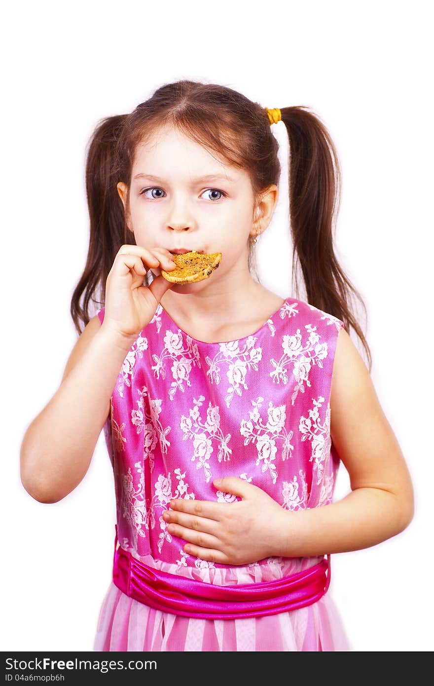 Little sweet girl eating cookie, over white. Little sweet girl eating cookie, over white