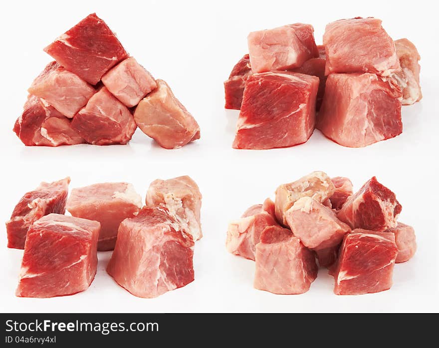 Pieces of fresh raw meat on white background