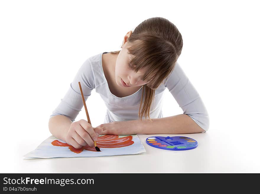 Image of a girl drawing color flower