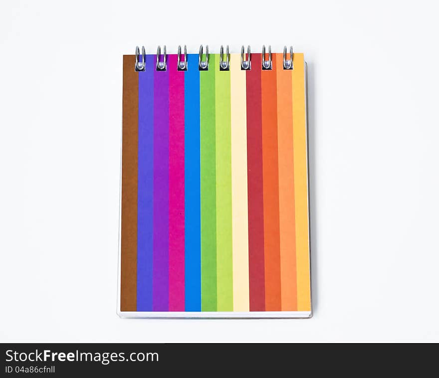 Notebook with colorful cover on background. Notebook with colorful cover on background