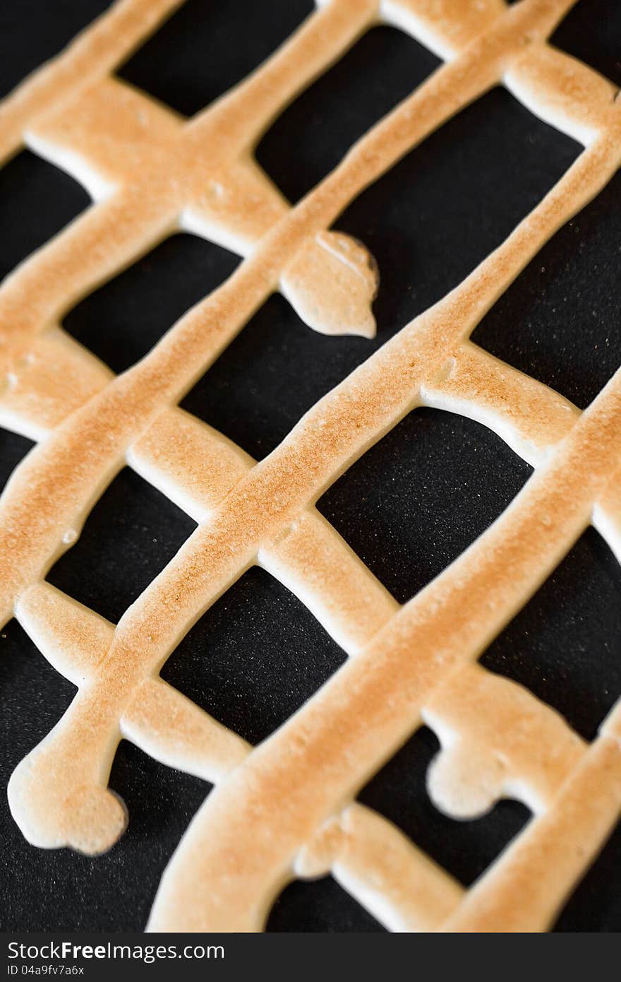 Grid shaped cookies on pan