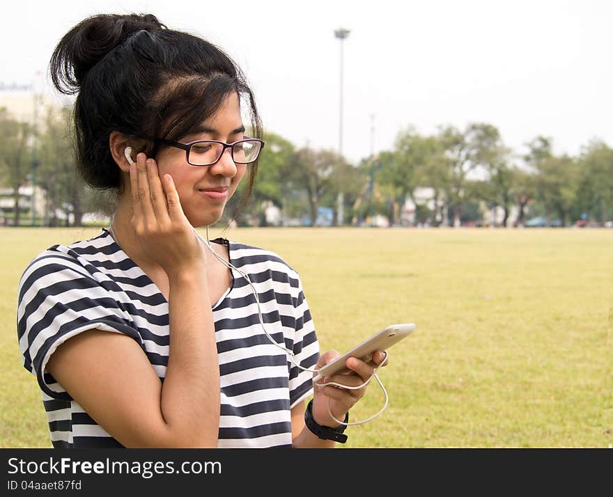 Woman listening to Music outdoor